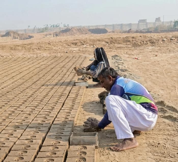 Person working at brick kiln - image 1